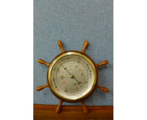A beech ship's wheel aneroid barometer