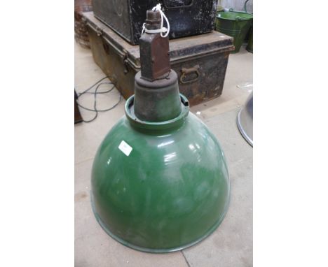 A green enamelled industrial lamp