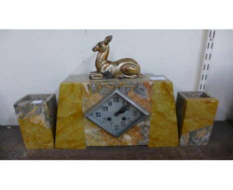 An Art Deco marble clock garniture