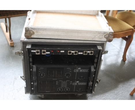 A Peavey CS800X Professional Stereo Power Amplifier with a CS1000X Professional Stereo Power Amplifier, in hard flight case