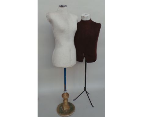 Two vintage mannequins. A cream female mannequin on a wood and metal stand with chrome top (bit wobbly). A brown male mannequ
