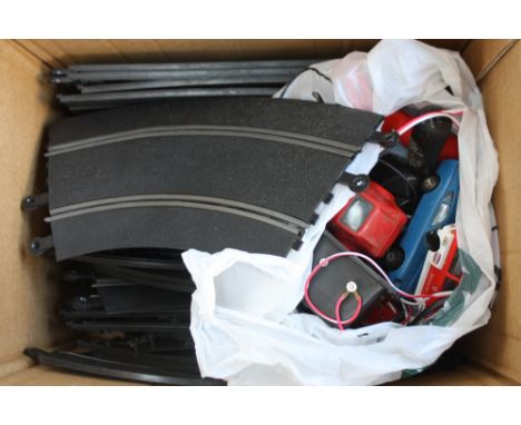 A box of Scalextric track, power unit and Datsun 260Z; Porsche 911 turbo and Mini Metro