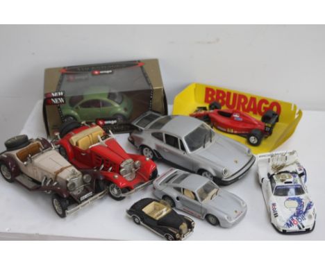 Five Burago cars - different scales 1/20 and 1/24 to include Mercedes Benz 500K Roadster (1936); Mercedes Benz SSK 1928; VW B