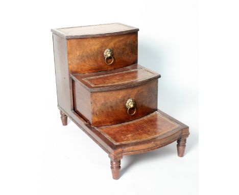 A Regency mahogany bedroom step/commode, gilded leather steps with brass lion mask loop handles, raised on turned legs