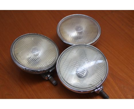 Three Lucas SFT 700 spot/fog lights for Mini Cooper rally car and 1959/60 Austin Mini Seven factory workshop manual and other
