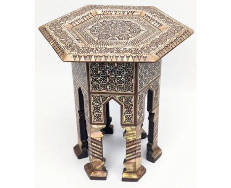 A fine late 19th/ early 20th century Ottoman Egyptian mother of pearl inlaid miniature table (trader sample), H.18cm