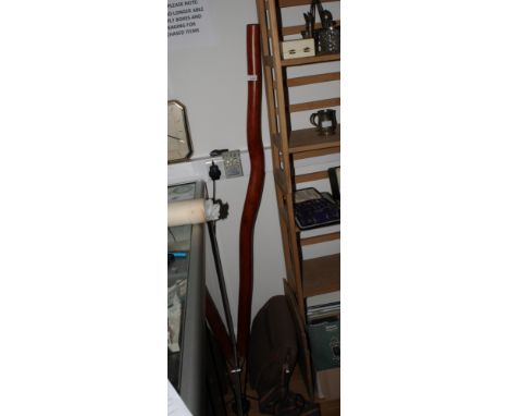 An Australian carved hardwood didgeridoo, 61" long
