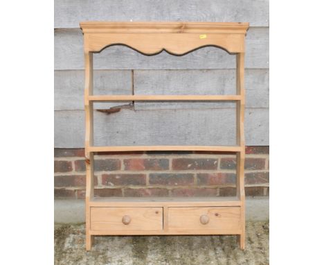 A pine wall shelf, fitted two lower drawers, 26" wide, and a bamboo framed wall shelf, 13" wide