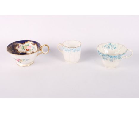 A Wedgwood part tea service decorated floral reserves on a blue and gilt ground and two other late 19th Century tea services