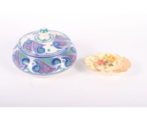 A Carter Stabler & Adams Poole Pottery powder bowl and cover decorated in green and blue and a Royal Worcester ivory blush tr