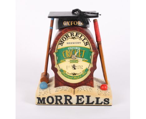 A Morrells Brewery "Oxford Cricket" novelty mantel clock with quartz movement