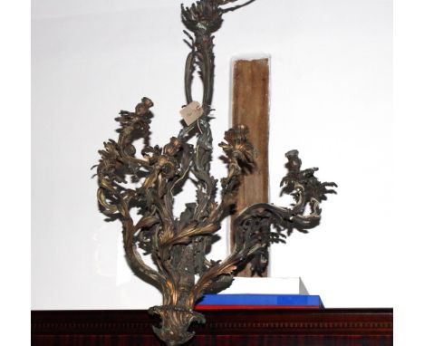A 19th Century Rococo design gilt metal pendant centre light fitted ten candle holders with leaf decoration, 47" high