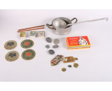 A Nazi aluminium saucepan, a companion ladle, five 1930s/1940s Nazi aluminium badges and assorted Spanish Facist memorabilia,