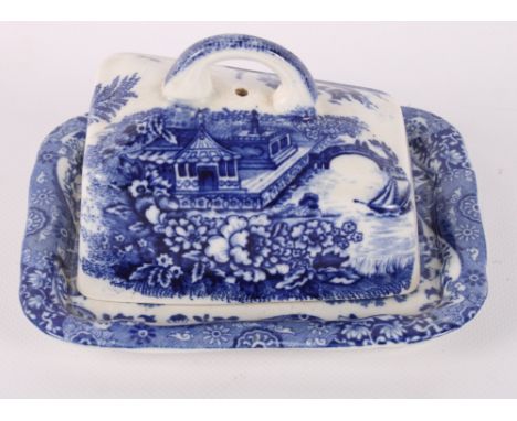 A Willow pattern part teaset, a similar butter dish, three pieces of Spode Italian and other blue and white china