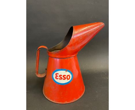 An Esso half gallon measure, dated 1970.