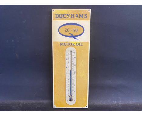 A small Duckham's 20-50 Motor Oil aluminium thermometer, 5 1/2 x 14". 