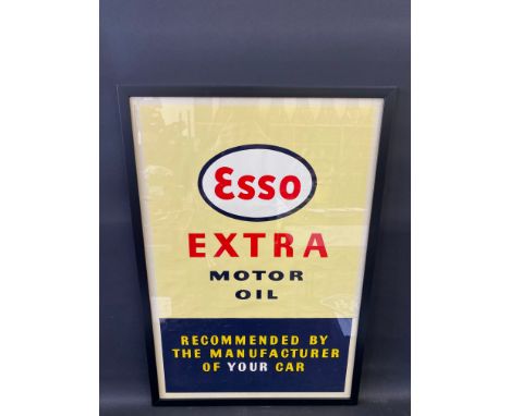An original Esso Extra Motor Oil advertisement, framed and glazed, 21 1/2 x 31 1/2". 
