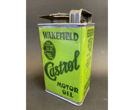An early Wakefield Castrol Motor Oil quart oil can, early light green version in good condition, stamped underneath Williamso
