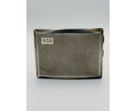 Silver engine turned cigarette case with engraved initials to panel, 162g, Birmingham 1927. Estimate £100-120.