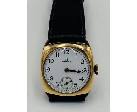 A gold plated 1930's cushion cased Omega gents wrist watch, in going order. Estimate £140-180.