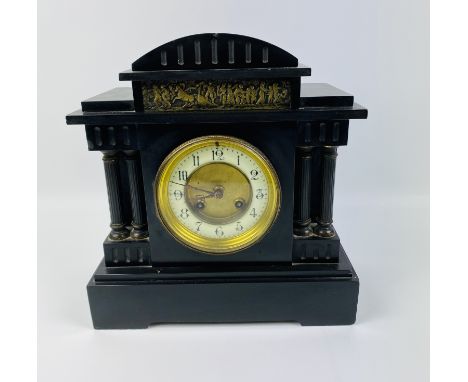 A late 19th century French architectural style slate mantel clock, with an eight day movement and striking on a gong, pendulu