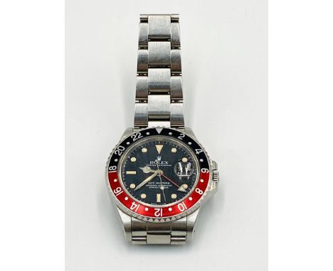 Rolex stainless steel Oyster Perpetual GMT-Master II, superlative chronometer, black dial with luminous hour markers and red 
