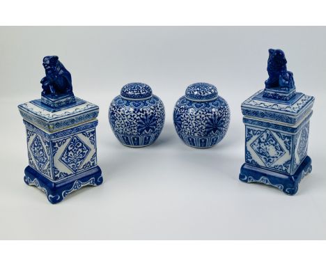 A pair of Chinese blue and white porcelain ginger jars and covers, 10.5cms wide x 12cms high; together with a pair of Chinese