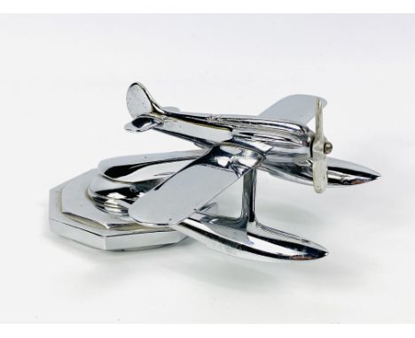 A Schneider Trophy Seaplane chrome plated car mascot by Desmo, mounted upon an octagonal radiator cap c.1930's. 15cms long x 