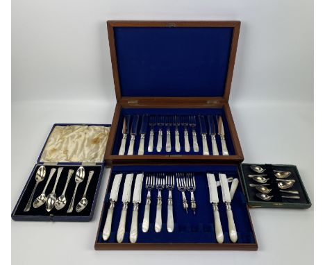A two tier mahogany cased part set of decorative mother and pearl knives and forks, 37cms wide x 26.5cms deep x 7cms high; to