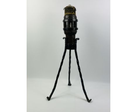A rustic hand made wrought iron and wooden lamp, constructed using a hub from an old cart wheel, 35cm wide, 35cm deep, 71cm h