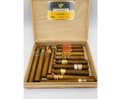 A quantity of cigars to include three Behike Cohiba cigars. Estimate: £400-450