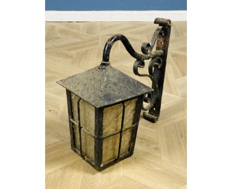 Metal wall bracket and lantern, 41cm high. Estimate £40-60