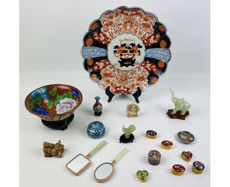 A collection of various Oriental and Eastern items to include, cloisonne, jade, an Imari charger, small soapstone carving and