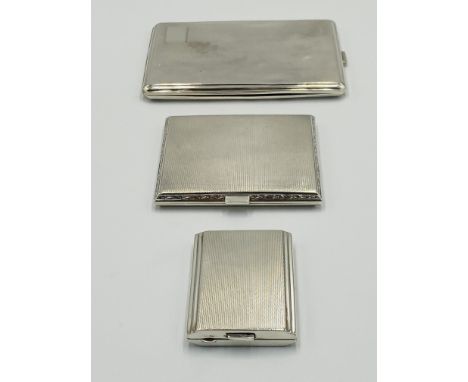 Three engine turned silver cases, largest 11.5cm x 8.5cm, 268g total. Estimate £140-160.