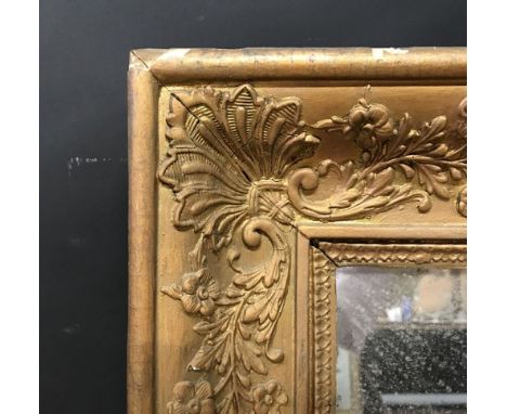 19th Century English School. A Gilt Composition Frame with inset mirror glass, 31" x 26.75" (rebate).