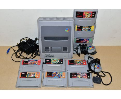 SNES GAMES AND CONSOLE, games include the rare title The Legend of The Mystical Ninja, Super Mario All Stars, Disney's Aladdi