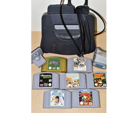 N64 CONSOLE, EXPANSION PAK, TRANSFER PAKS AND GAMES, games include Pokemon Stadium, Legend of Zelda Majora's Mask, Snowboard 