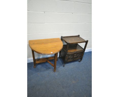 AN OAK OVAL GATE LEG TABLE, open length 103cm x closed length 23cm x depth 74cm x height 73cm, and an oak tea trolley (condit