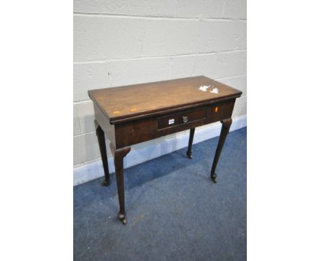 A GEORGE III MAHOGANY TEA TABLE, the fold over top and gate leg, single frieze drawer, on cylindrical legs, padded feet, and 