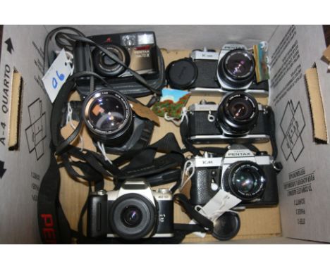 A TRAY CONTAINING SIX PENTAX CAMERAS including a K1000 with a M 50mm f2 lens, a KM with a M 50mm f1.4 lens, a MX with a Vivit