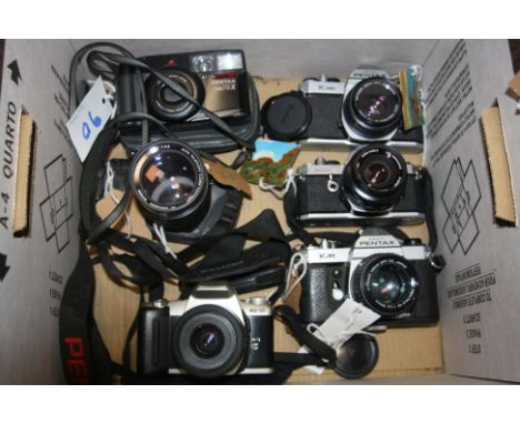 A TRAY CONTAINING SIX PENTAX CAMERAS including a K1000 with a M 50mm f2 lens, a KM with a M 50mm f1.4 lens, a MX with a Vivit