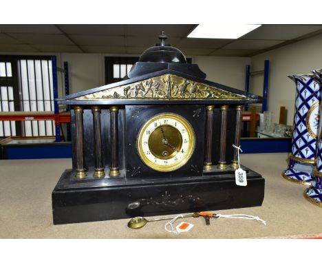 A NINETEENTH CENTURY BLACK SLATE MANTEL CLOCK, of architectural form, the case having six columns, figural frieze and dome ab