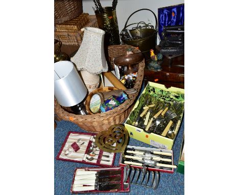 TWO BOXES AND LOOSE HOUSEHOLD SUNDRIES, to include a large Victorian writing box, one box of cutlery, sugar tongs, knives, et