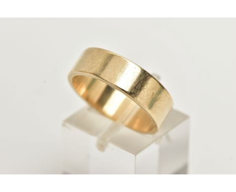 A 9CT GOLD WIDE BAND RING, flat polished band, approximate band width 5.9mm, hallmarked 9ct Birmingham, ring size P, approxim