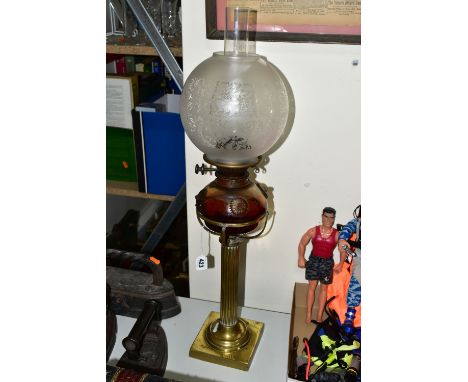 AN OIL LAMP BY S HOOPER, BIRMINGHAM, with glass reservoir having moulded daisy decoration, supported on a brass column above 