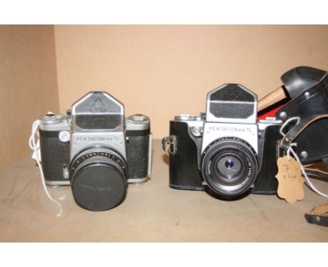 TWO PENTACON SIX TL FILM CAMERAS both with Biometar 80mm f2.8 lens and one with leather case and two view finders (4)