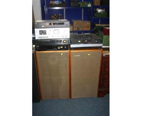 A VINTAGE COMPONANT HI FI comprising of a NAD 5000 compact disc player with remote ( doesn't read disc), a Carver CM1040 rack