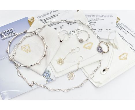 ASSORTED JEWELLERY, to include a silver bangle detailed with flowers, each alternating flower is set with a small single cut 