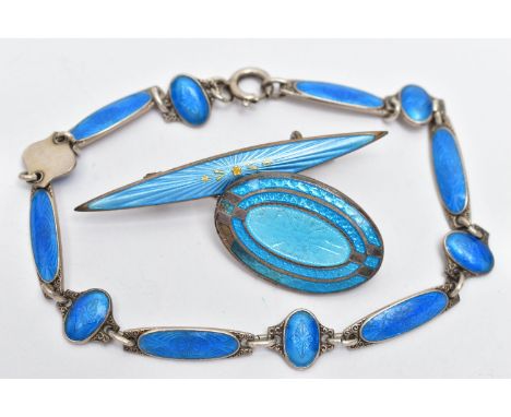THREE PIECES OF GUILLOCHE ENAMEL JEWELLERY, to include a bar brooch, detailed with a blue guilloche enamel and gold floral de
