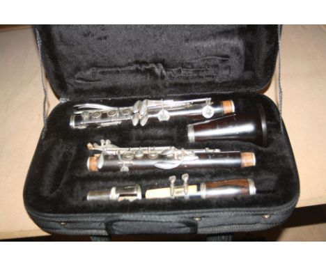 A BOOSEY AND HAWKES REGENT CLARINET constructed from ebony Serial No 119257 in a Stagg  padded case